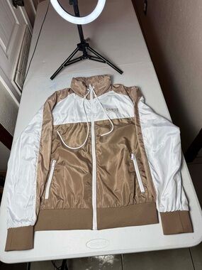 Used Guess white windbreaker jacket. Men's Sz L